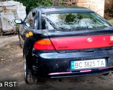 Синій Мазда 323, об'ємом двигуна 1.5 л та пробігом 454 тис. км за 1350 $, фото 1 на Automoto.ua