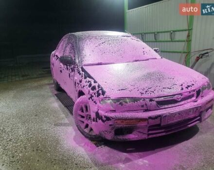 Синий Мазда 323, объемом двигателя 1.5 л и пробегом 430 тыс. км за 1300 $, фото 1 на Automoto.ua