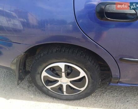 Синий Мазда 323, объемом двигателя 1.5 л и пробегом 295 тыс. км за 2300 $, фото 13 на Automoto.ua