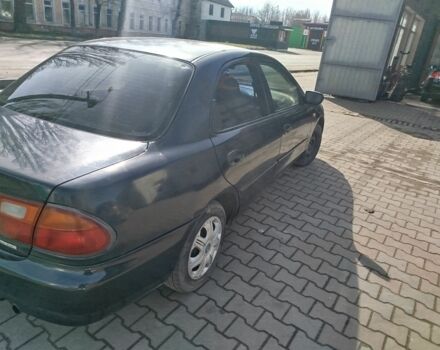 Синий Мазда 323, объемом двигателя 0 л и пробегом 287 тыс. км за 1700 $, фото 6 на Automoto.ua