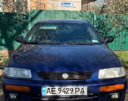 Синий Мазда 323, объемом двигателя 1.5 л и пробегом 419 тыс. км за 2500 $, фото 3 на Automoto.ua