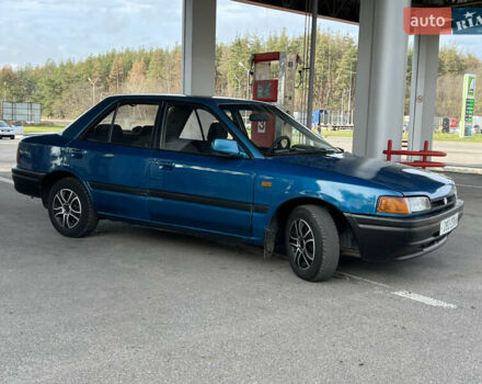 Синий Мазда 323, объемом двигателя 1.6 л и пробегом 250 тыс. км за 1900 $, фото 4 на Automoto.ua