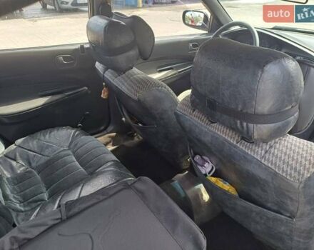 Синий Мазда 323, объемом двигателя 1.5 л и пробегом 295 тыс. км за 2300 $, фото 6 на Automoto.ua