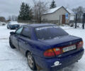 Синий Мазда 323, объемом двигателя 1.5 л и пробегом 250 тыс. км за 999 $, фото 2 на Automoto.ua