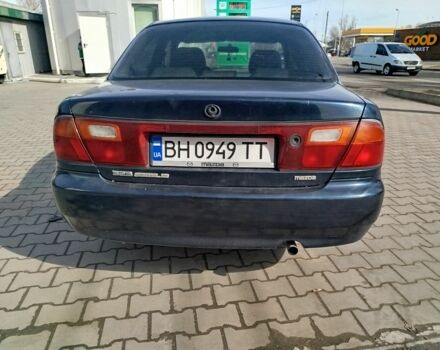 Синий Мазда 323, объемом двигателя 0 л и пробегом 287 тыс. км за 1700 $, фото 5 на Automoto.ua