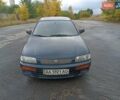 Синий Мазда 323, объемом двигателя 1.49 л и пробегом 250 тыс. км за 1450 $, фото 1 на Automoto.ua