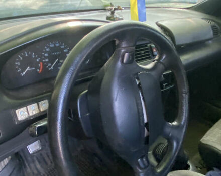 Синій Мазда 323, об'ємом двигуна 1.3 л та пробігом 395 тис. км за 1750 $, фото 6 на Automoto.ua