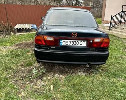 Синий Мазда 323, объемом двигателя 1.3 л и пробегом 300 тыс. км за 1700 $, фото 4 на Automoto.ua