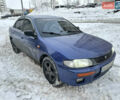 Синий Мазда 323, объемом двигателя 1.49 л и пробегом 250 тыс. км за 1000 $, фото 3 на Automoto.ua