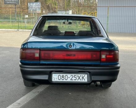 Синий Мазда 323, объемом двигателя 1.6 л и пробегом 250 тыс. км за 1900 $, фото 3 на Automoto.ua