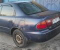 Синий Мазда 323, объемом двигателя 1.8 л и пробегом 350 тыс. км за 1600 $, фото 3 на Automoto.ua