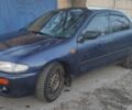 Синій Мазда 323, об'ємом двигуна 1.8 л та пробігом 350 тис. км за 1600 $, фото 2 на Automoto.ua