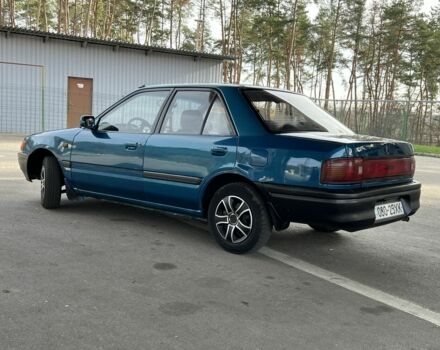 Синий Мазда 323, объемом двигателя 1.6 л и пробегом 250 тыс. км за 1900 $, фото 2 на Automoto.ua
