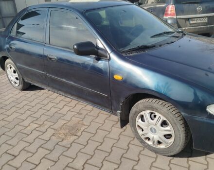 Синий Мазда 323, объемом двигателя 0 л и пробегом 287 тыс. км за 1700 $, фото 2 на Automoto.ua