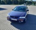 Синий Мазда 323, объемом двигателя 1.5 л и пробегом 290 тыс. км за 1999 $, фото 1 на Automoto.ua