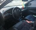 Синий Мазда 323, объемом двигателя 1.5 л и пробегом 297 тыс. км за 2500 $, фото 4 на Automoto.ua