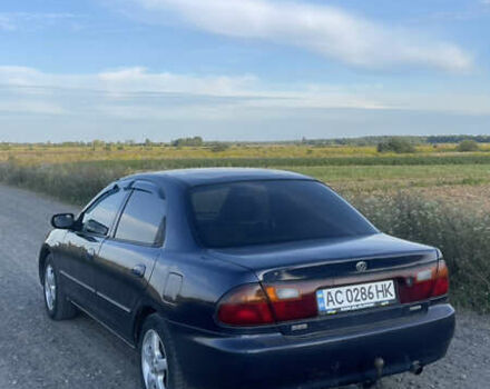 Синий Мазда 323, объемом двигателя 1.6 л и пробегом 352 тыс. км за 1370 $, фото 5 на Automoto.ua
