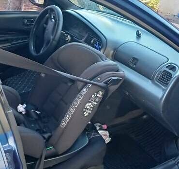 Синий Мазда 323, объемом двигателя 1.5 л и пробегом 400 тыс. км за 1300 $, фото 6 на Automoto.ua