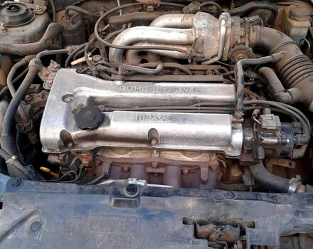 Синий Мазда 323, объемом двигателя 1.5 л и пробегом 402 тыс. км за 2500 $, фото 3 на Automoto.ua