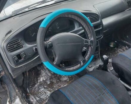 Синій Мазда 323, об'ємом двигуна 1.5 л та пробігом 100 тис. км за 420 $, фото 2 на Automoto.ua