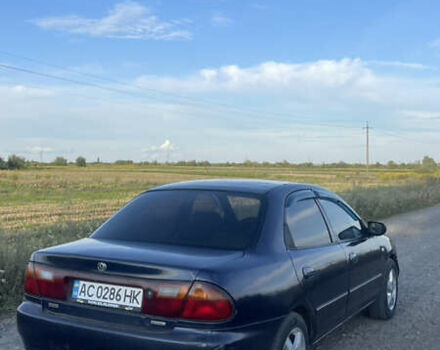 Синий Мазда 323, объемом двигателя 1.6 л и пробегом 352 тыс. км за 1370 $, фото 3 на Automoto.ua