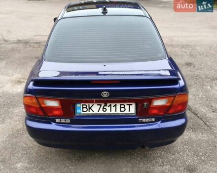 Синий Мазда 323, объемом двигателя 1.5 л и пробегом 342 тыс. км за 2600 $, фото 10 на Automoto.ua