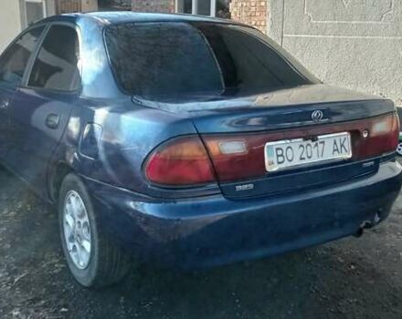 Синий Мазда 323, объемом двигателя 1.5 л и пробегом 400 тыс. км за 1300 $, фото 5 на Automoto.ua