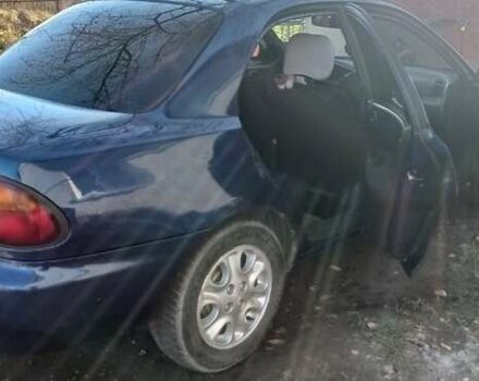 Синий Мазда 323, объемом двигателя 1.5 л и пробегом 400 тыс. км за 1300 $, фото 9 на Automoto.ua