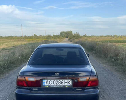 Синий Мазда 323, объемом двигателя 1.6 л и пробегом 352 тыс. км за 1370 $, фото 4 на Automoto.ua