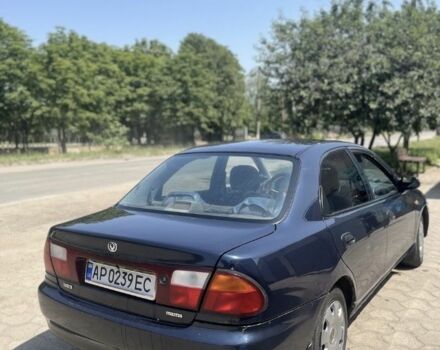 Синій Мазда 323, об'ємом двигуна 1.5 л та пробігом 1000 тис. км за 1100 $, фото 2 на Automoto.ua