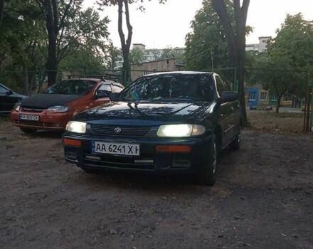 Синий Мазда 323, объемом двигателя 1.5 л и пробегом 297 тыс. км за 2500 $, фото 1 на Automoto.ua