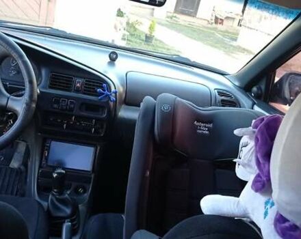 Синий Мазда 323, объемом двигателя 1.5 л и пробегом 400 тыс. км за 1300 $, фото 1 на Automoto.ua