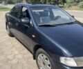 Синій Мазда 323, об'ємом двигуна 1.5 л та пробігом 1000 тис. км за 1100 $, фото 1 на Automoto.ua