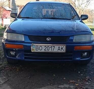 Синий Мазда 323, объемом двигателя 1.5 л и пробегом 400 тыс. км за 1300 $, фото 7 на Automoto.ua