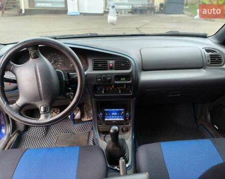 Синий Мазда 323, объемом двигателя 1.5 л и пробегом 342 тыс. км за 2600 $, фото 8 на Automoto.ua