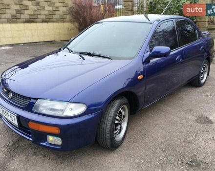 Синий Мазда 323, объемом двигателя 1.5 л и пробегом 342 тыс. км за 2600 $, фото 1 на Automoto.ua