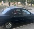 Синій Мазда 323, об'ємом двигуна 1.5 л та пробігом 300 тис. км за 2000 $, фото 2 на Automoto.ua