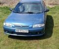 Синій Мазда 323, об'ємом двигуна 1.5 л та пробігом 312 тис. км за 2200 $, фото 1 на Automoto.ua