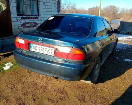 Синий Мазда 323, объемом двигателя 1.5 л и пробегом 300 тыс. км за 1750 $, фото 6 на Automoto.ua