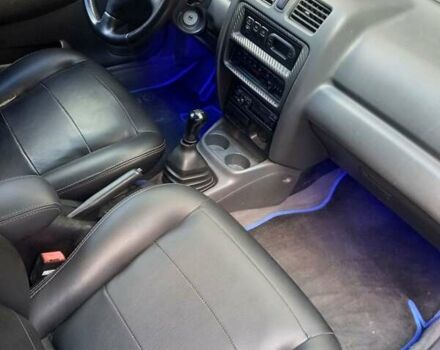 Синий Мазда 323, объемом двигателя 1.8 л и пробегом 443 тыс. км за 3300 $, фото 3 на Automoto.ua