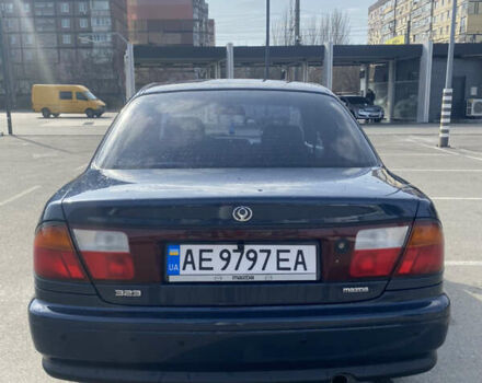 Синий Мазда 323, объемом двигателя 1.5 л и пробегом 330 тыс. км за 3000 $, фото 4 на Automoto.ua