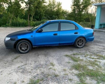 Синий Мазда 323, объемом двигателя 1.8 л и пробегом 275 тыс. км за 784 $, фото 4 на Automoto.ua