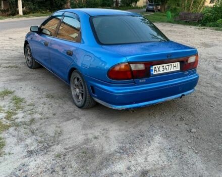 Синий Мазда 323, объемом двигателя 1.8 л и пробегом 275 тыс. км за 784 $, фото 5 на Automoto.ua