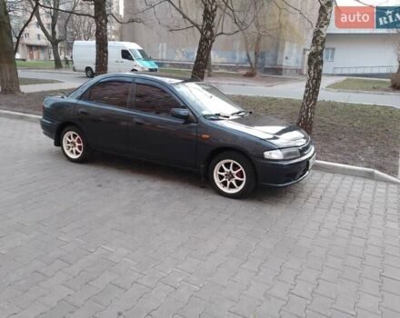 Синій Мазда 323, об'ємом двигуна 1.5 л та пробігом 309 тис. км за 2750 $, фото 12 на Automoto.ua