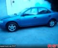 Синій Мазда 323, об'ємом двигуна 1.5 л та пробігом 257 тис. км за 950 $, фото 1 на Automoto.ua