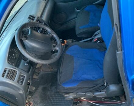 Синий Мазда 323, объемом двигателя 1.8 л и пробегом 275 тыс. км за 784 $, фото 6 на Automoto.ua