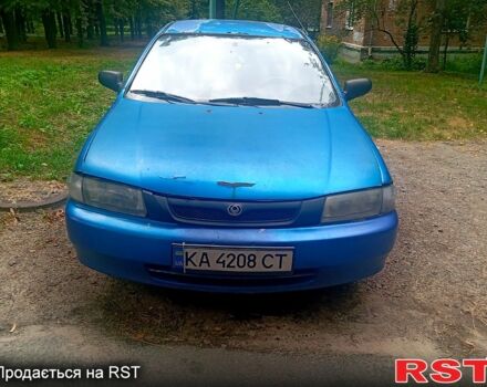 Синій Мазда 323, об'ємом двигуна 1.5 л та пробігом 340 тис. км за 800 $, фото 2 на Automoto.ua