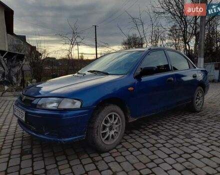 Синій Мазда 323, об'ємом двигуна 1.8 л та пробігом 238 тис. км за 3200 $, фото 8 на Automoto.ua