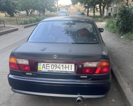 Синій Мазда 323, об'ємом двигуна 1.5 л та пробігом 300 тис. км за 2000 $, фото 3 на Automoto.ua