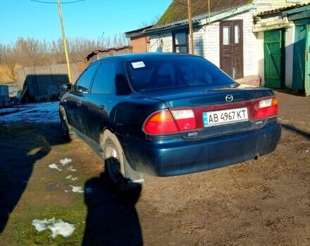Синий Мазда 323, объемом двигателя 1.5 л и пробегом 300 тыс. км за 1750 $, фото 3 на Automoto.ua